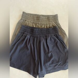 2 Pairs of Vuori Villa Trouser Shorts. Black and Green